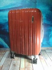 Коричневый (древесный) чемодан из поликарбоната размер С+.